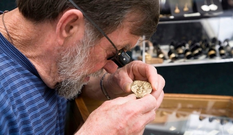 inspecting a gold item