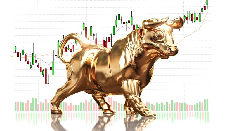 gold bull with gold chart in the background