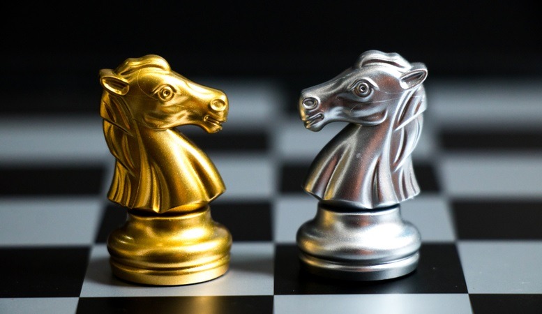 gold and silver chess horses featured image