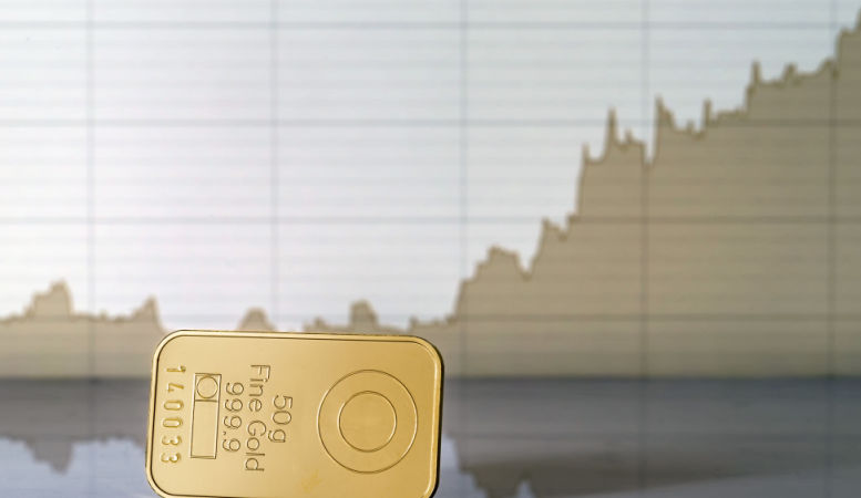 gold bar on the background of growth chart