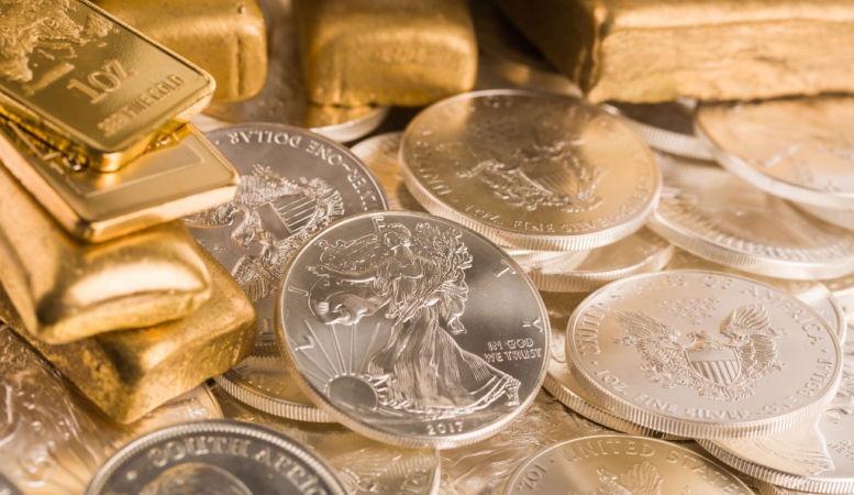 gold and silver bullion on the table