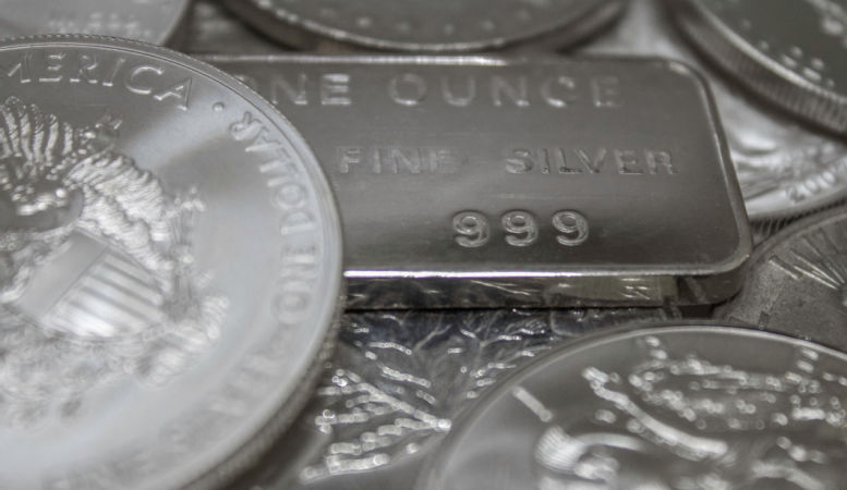 silver bar and silver coins