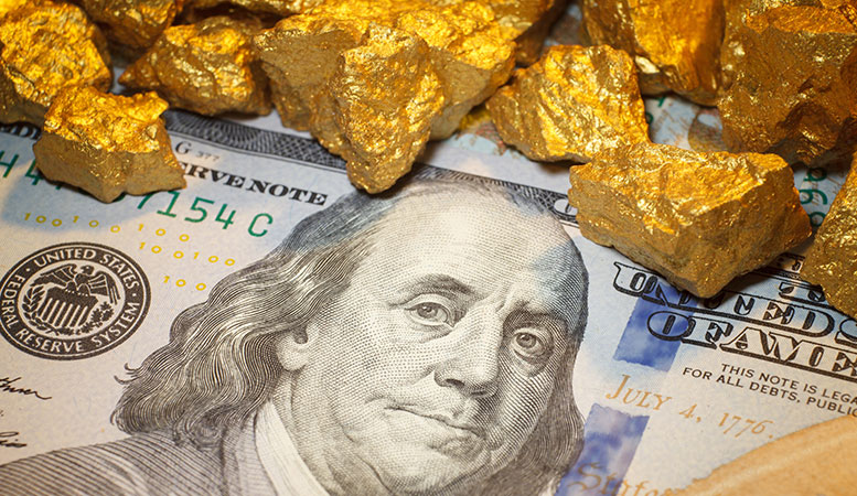 gold nuggets and us dollar bill