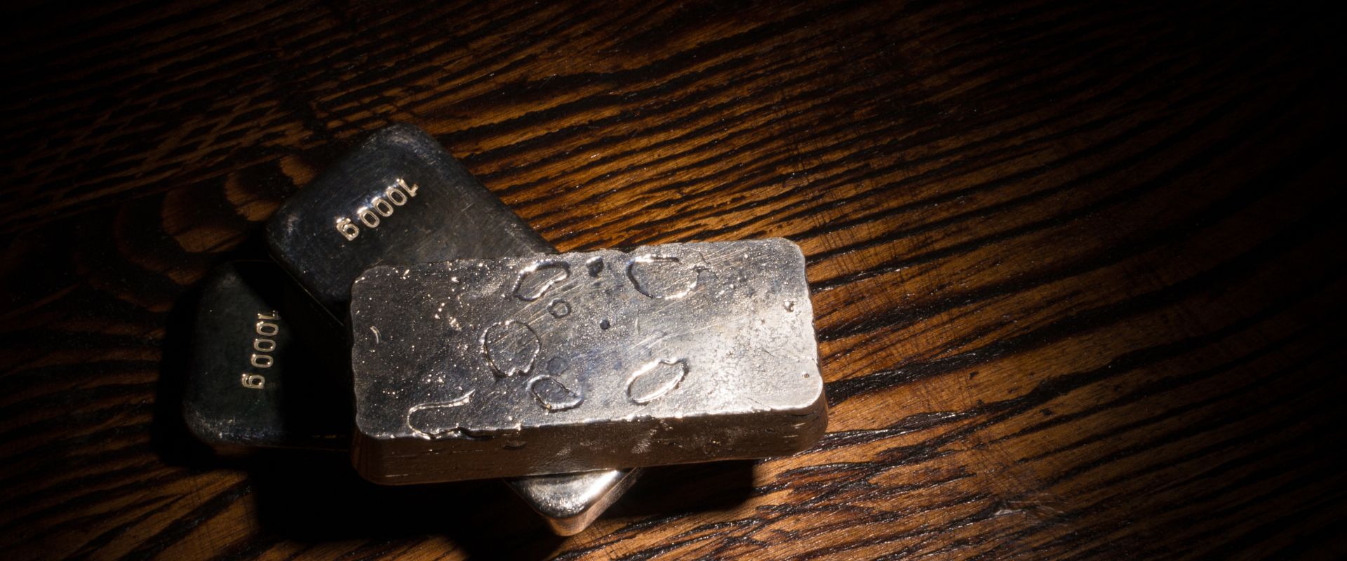 rough silver bars in a table