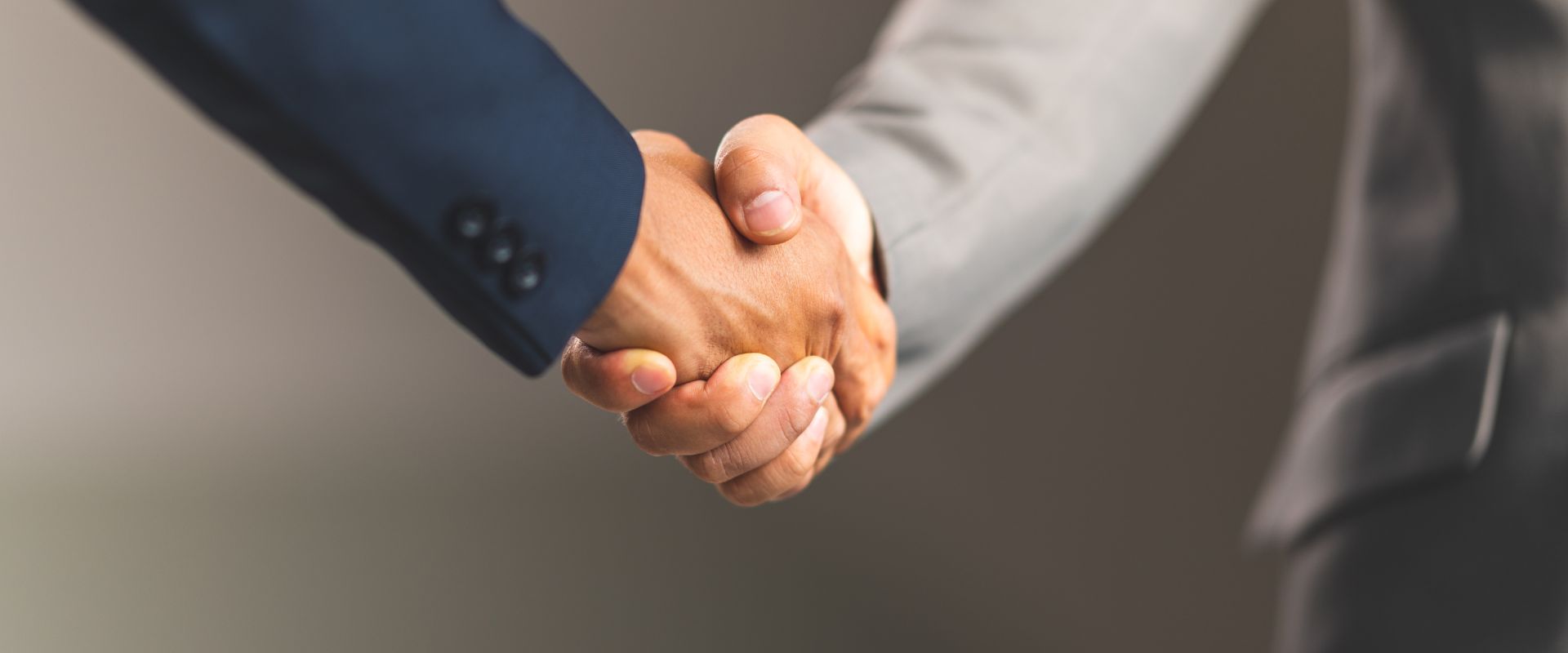shaking hands for a merger
