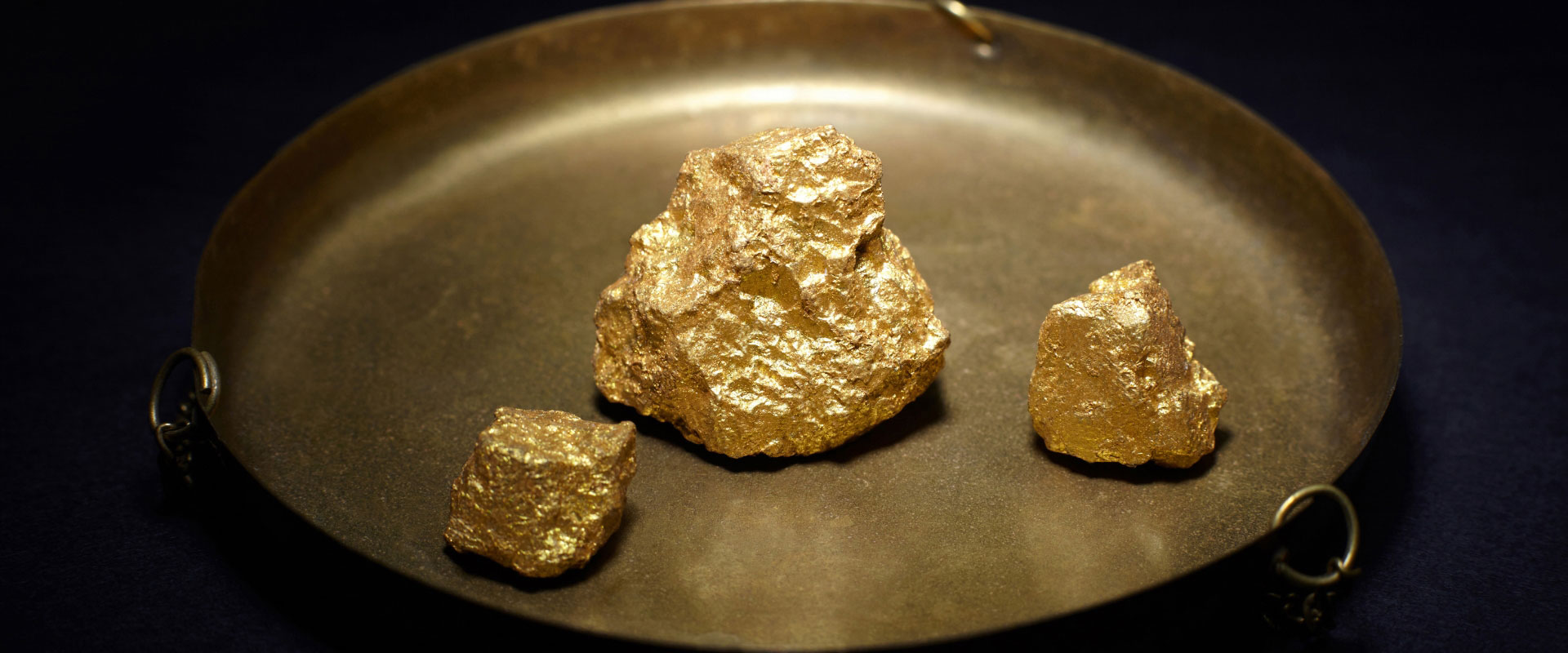 three pieces gold nuggets