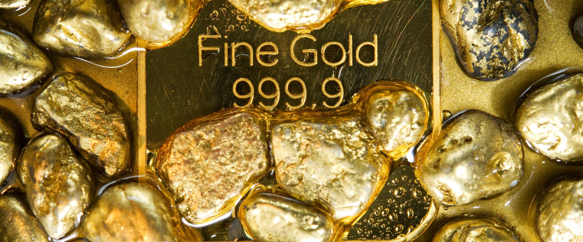 ten ounces pure gold bar and gold nuggets