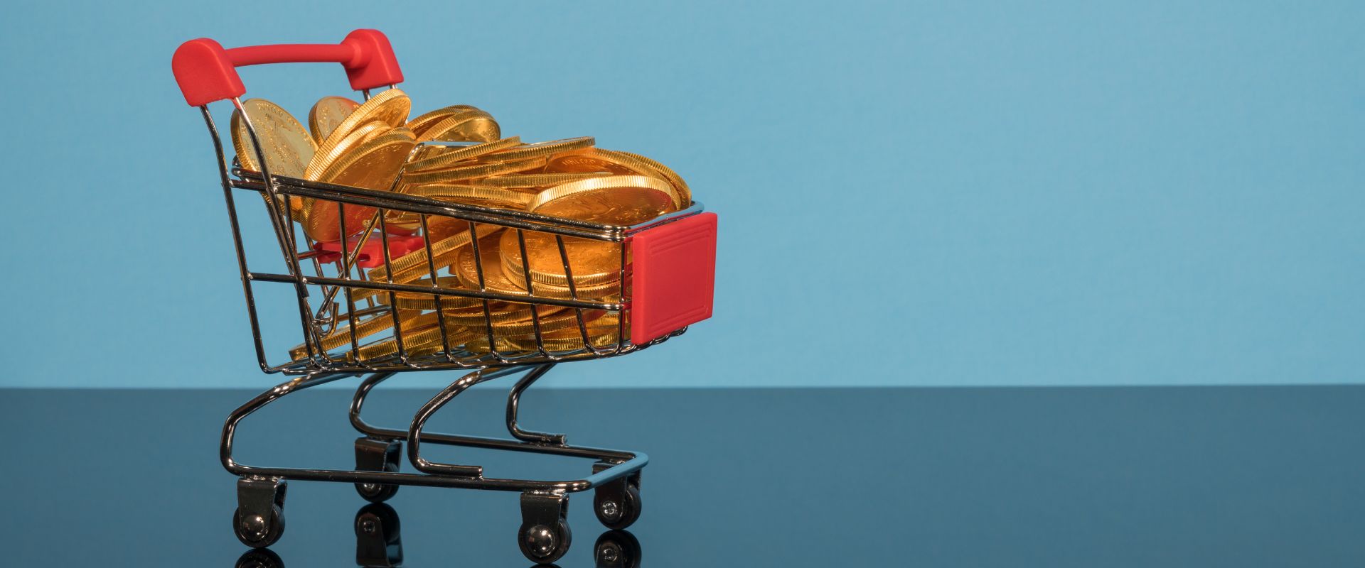 shopping cart full of gold coins