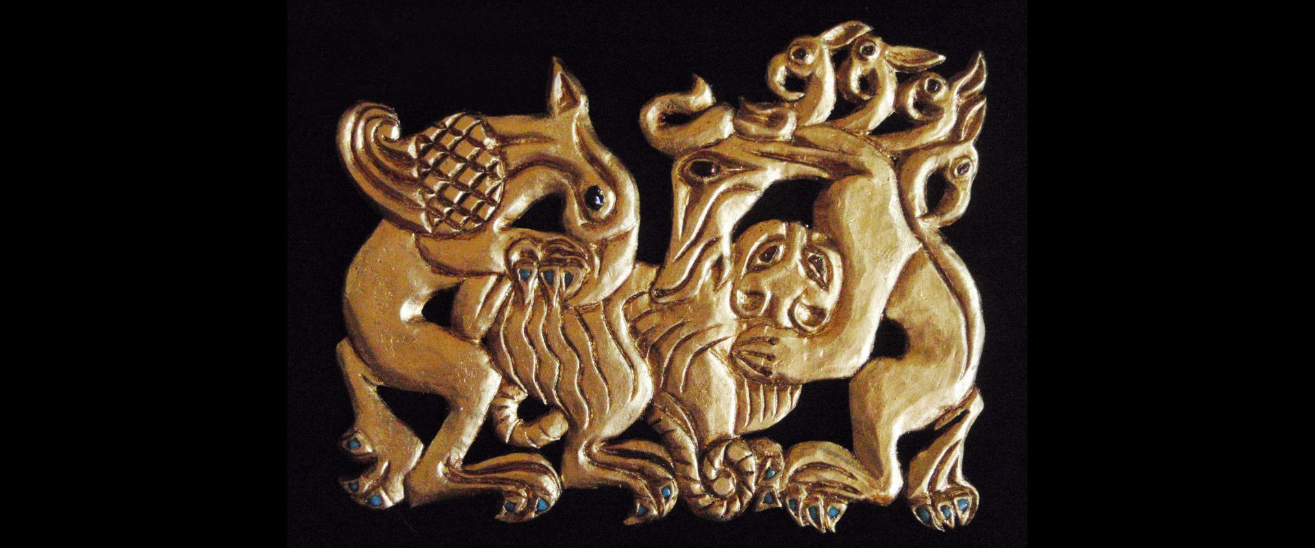 Scythian gold artifacts on black background