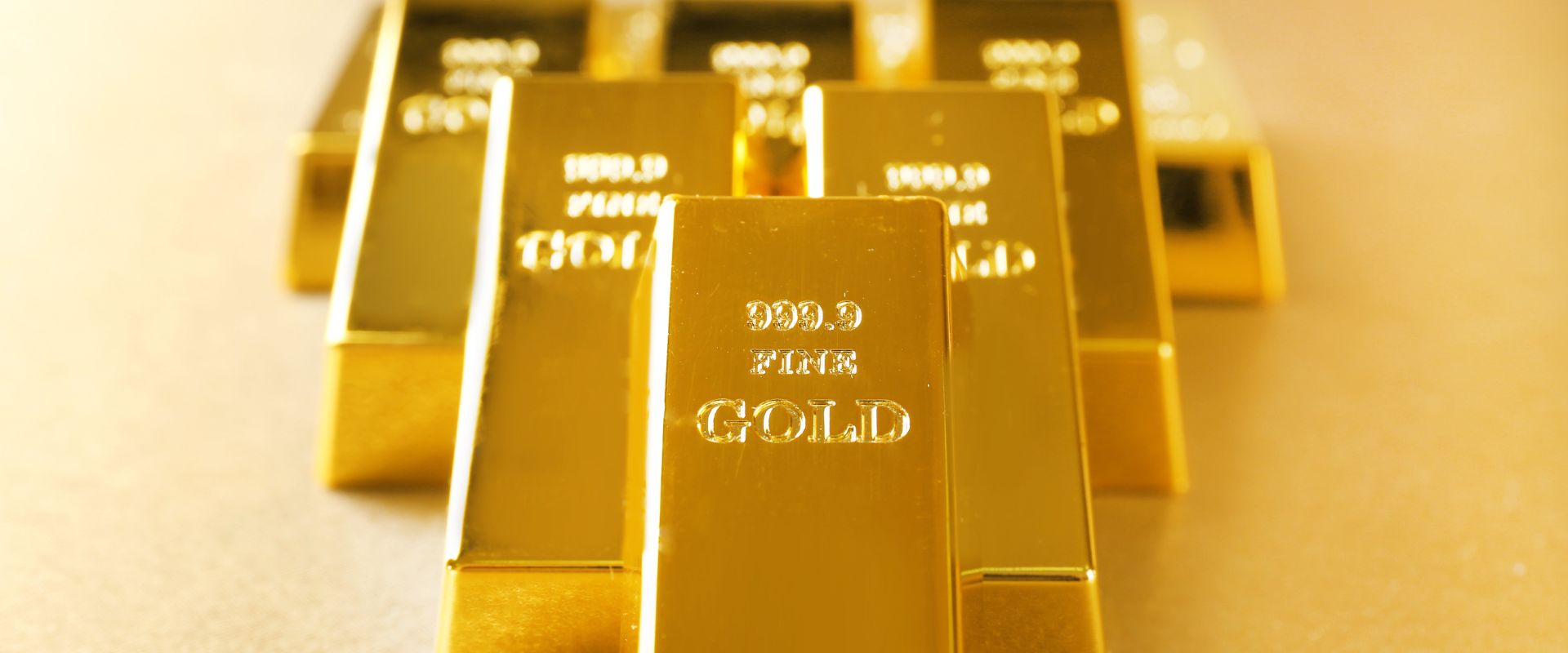 close up of stacks of engraved gold bars