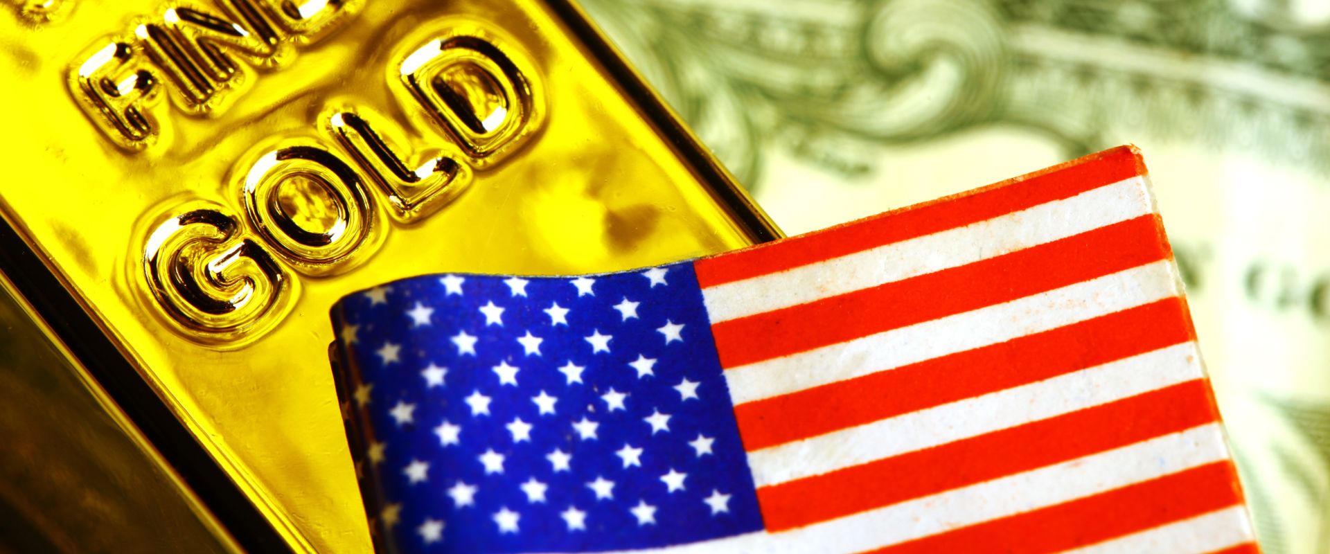 united states flag and gold bar on dollar banknote background